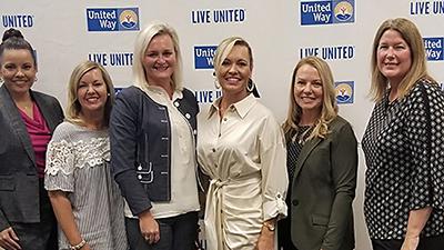 WVU coaches wives and United Way representatives